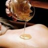 Relaxing hot oil massage by caucasian female RMT