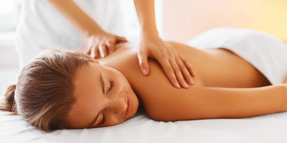 spa-woman-female-enjoying-massage-in-spa-centre-royalty-free-image-492676582-1549988720.jpg