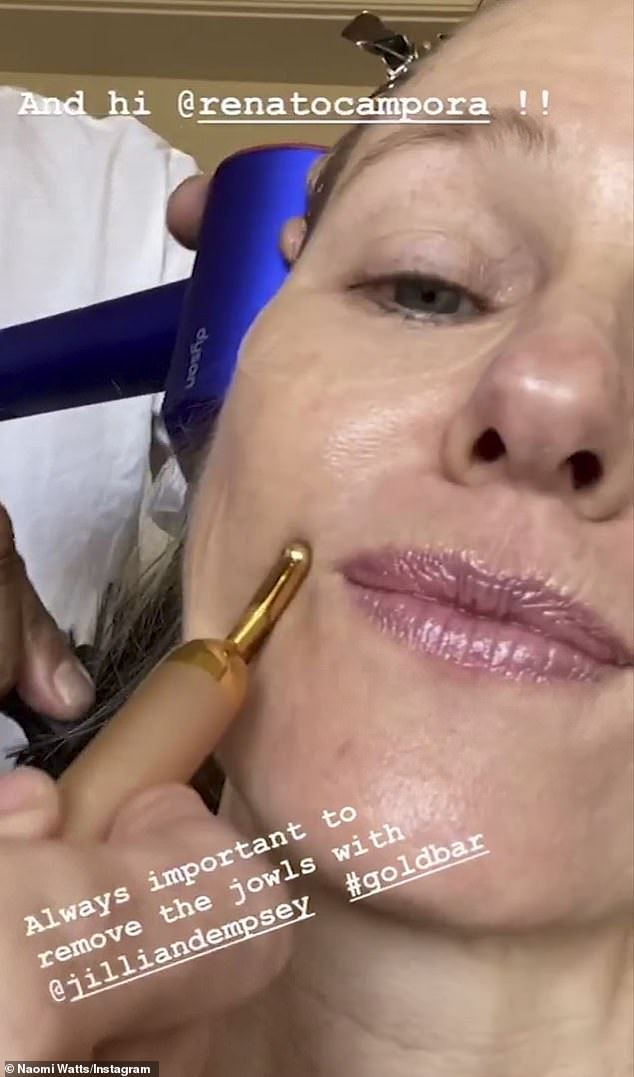 'Removing the jowls': She then posted video showing her getting her face smoother out with a Jillian Dempsey Gold Bar face massager as a stylist blow dried her hair