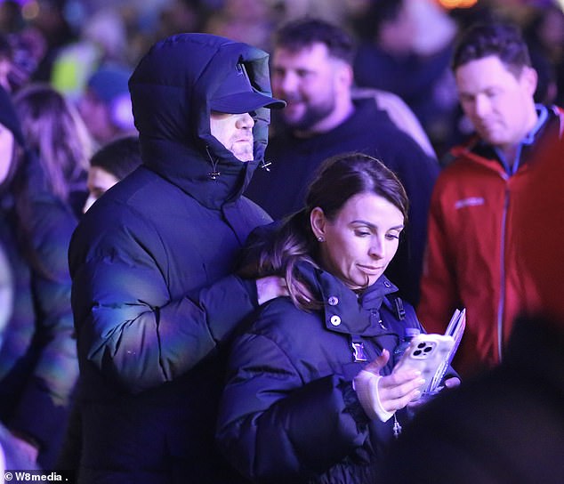 Coleen and Wayne Rooney looked loved-up on Sunday as they took their son Klay to Winter Wonderland