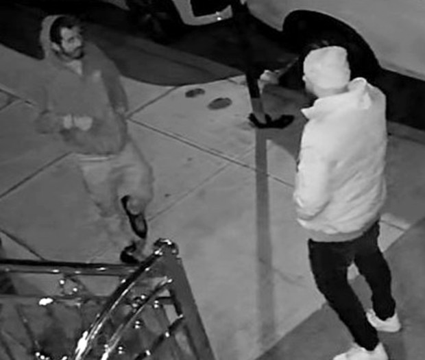 Cops released surveillance photos of the two men, who are described as in their 30s, between 5'9 and 6'0 tall, with slim builds and black hair. (NYPD)