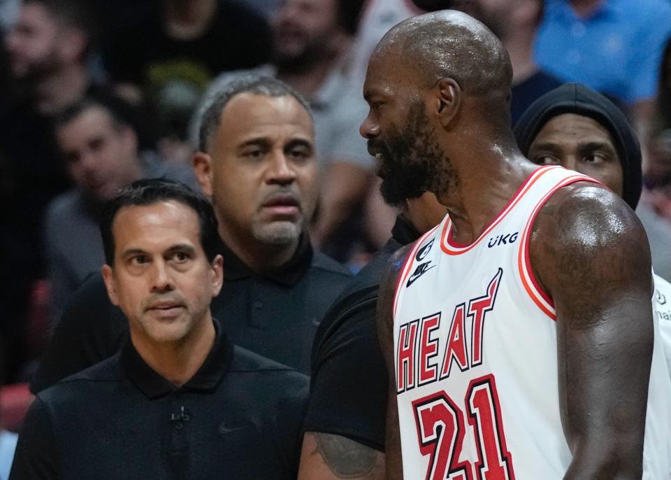 Miami Heat center Dewayne Dedmon argues with head coach Erik Spoelstra before storming off the court during their game Tuesday. (AP Photo/Wilfredo Lee)