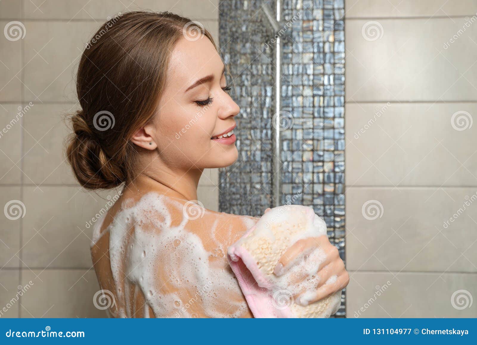 young-woman-covered-soap-foam-taking-shower-young-woman-covered-soap-foam-taking-shower-bathroom-131104977.jpg