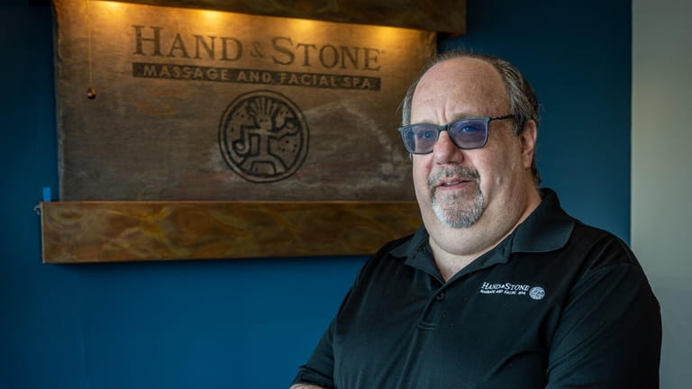 Alan Bernstein, owner of a Hand & Stone Massage and...